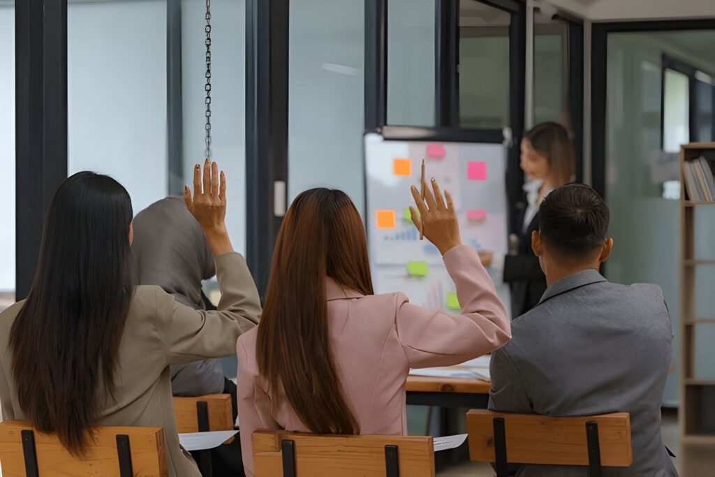 A group of people undergoing training on magnet handling