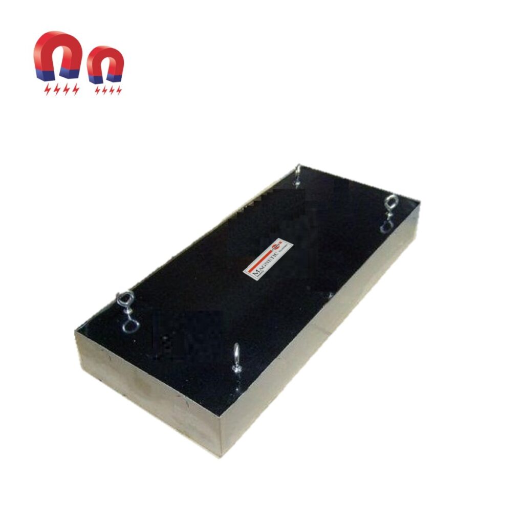 Rectangular magnetic lifter with four lifting eyes. Black top, silver sides, white background.