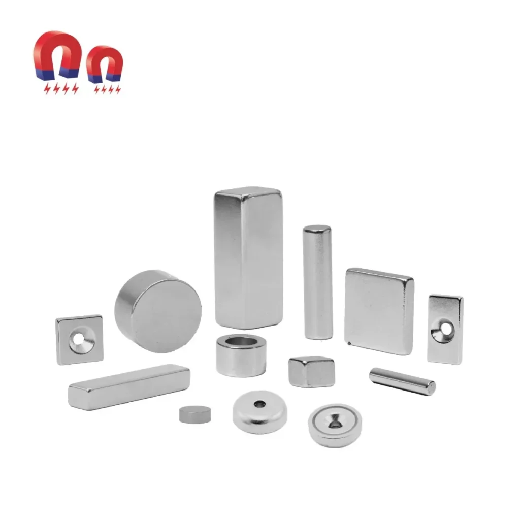 Assorted shiny silver magnets in various shapes: discs, blocks, cylinders, with holes.